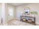 Inviting entryway featuring a stylish console table, decorative mirror, and neutral decor at 1085 Bevy Blvd, Danville, IN 46122