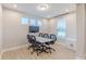 Bright flex space featuring a large table, perfect for meetings or creative projects at 1085 Bevy Blvd, Danville, IN 46122