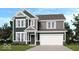Charming two-story home with a two-car garage and well-manicured lawn at 1088 Bevy Blvd, Danville, IN 46122