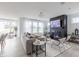Spacious living room with modern fireplace and adjacent sitting area with lots of natural light at 1088 Bevy Blvd, Danville, IN 46122