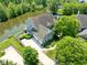 Aerial view of the home on a waterfront property at 11061 Mast Ct, Fishers, IN 46040