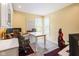 A bright office space with desk, chair, and natural light at 11061 Mast Ct, Fishers, IN 46040