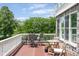 Spacious outdoor deck with a bistro table set perfect for enjoying the scenic views at 11061 Mast Ct, Fishers, IN 46040