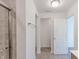 Bright bathroom featuring neutral tile flooring and modern fixtures at 1108 Bevy Blvd, Danville, IN 46122