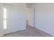 Bright bedroom with closet and neutral carpet, providing a clean and modern look at 1108 Bevy Blvd, Danville, IN 46122
