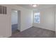 Bedroom with neutral carpeting and a well-lit window at 1108 Bevy Blvd, Danville, IN 46122
