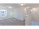 Upstairs room with neutral carpeting and plenty of natural light at 1108 Bevy Blvd, Danville, IN 46122