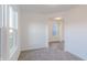Clean flex room with carpet and plenty of natural light coming in from the window at 1108 Bevy Blvd, Danville, IN 46122