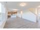 Expansive living room seamlessly flows into the kitchen with a staircase that leads upstairs at 1108 Bevy Blvd, Danville, IN 46122