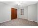 Comfortable bedroom with closet, window and neutral carpet at 11469 Woodview Ct, Fishers, IN 46038