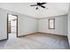 Spacious bedroom with vaulted ceiling, neutral carpet, and walk-in closet at 11469 Woodview Ct, Fishers, IN 46038