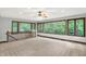 Upstairs bonus room featuring large windows and neutral carpet and wall paint at 11469 Woodview Ct, Fishers, IN 46038