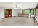 Upstairs bonus room featuring large windows and neutral carpet and wall paint at 11469 Woodview Ct, Fishers, IN 46038