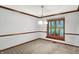 Dining room with traditional trim and a window dressed with wooden shutters at 11469 Woodview Ct, Fishers, IN 46038