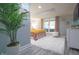 Stylish bedroom with soft colors, natural light, and modern decor at 11911 W Grandview Dr, Columbus, IN 47201