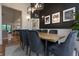 Stylish dining room with modern lighting, designer decor, and a large table for entertaining at 11911 W Grandview Dr, Columbus, IN 47201