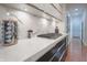 Contemporary kitchen features marble backsplash, stainless steel appliances, and ample counter space at 11911 W Grandview Dr, Columbus, IN 47201