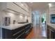Kitchen area with stainless steel appliances and sleek cabinets at 11911 W Grandview Dr, Columbus, IN 47201