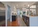 Gourmet kitchen featuring modern cabinets, stainless steel appliances, and hardwood floors at 11911 W Grandview Dr, Columbus, IN 47201