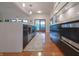 Modern kitchen with sleek countertops, stainless steel appliances, and hardwood flooring at 11911 W Grandview Dr, Columbus, IN 47201