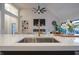 Modern sink in bright, open kitchen with stainless steel fixtures at 11911 W Grandview Dr, Columbus, IN 47201