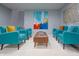 Inviting living room featuring cozy seating, modern art, and stylish decor at 11911 W Grandview Dr, Columbus, IN 47201
