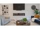 Close up of the open living room showcasing fireplace and stylish decor at 11911 W Grandview Dr, Columbus, IN 47201