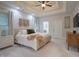 Spacious main bedroom with trey ceiling, soft carpet, and ensuite bathroom access at 11911 W Grandview Dr, Columbus, IN 47201