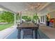 An outdoor dining area provides the perfect setting for al fresco meals with friends and Gathering at 11911 W Grandview Dr, Columbus, IN 47201
