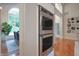 Stainless steel double ovens in a bright space near the dining area at 11911 W Grandview Dr, Columbus, IN 47201