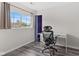 Bright office space with large window, modern furnishings, and plank flooring at 12524 Trophy Dr, Fishers, IN 46038