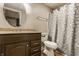 Bathroom with a vanity and a shower with patterned curtain at 12539 Pebblepointe Pass, Carmel, IN 46033