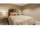 Cozy bedroom featuring a queen bed with decorative pillows at 12539 Pebblepointe Pass, Carmel, IN 46033