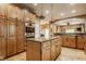 Well-appointed kitchen with stainless steel appliances, ample cabinetry, and a convenient island at 12539 Pebblepointe Pass, Carmel, IN 46033