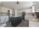 Contemporary kitchen with white cabinetry, granite countertops, stainless appliances, and center island at 12677 Honors Dr, Carmel, IN 46033