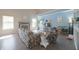 Spacious living room with fireplace, tall ceilings, and large windows for ample natural light at 12677 Honors Dr, Carmel, IN 46033