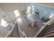 Spacious living room with fireplace, large windows, beautiful decor, and hardwood floors at 12677 Honors Dr, Carmel, IN 46033