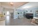 Open living space with hardwood floors and blue accent wall at 12677 Honors Dr, Carmel, IN 46033