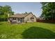 Exterior shot of a single-Gathering home with a well-maintained lawn and mature trees at 13911 Naples Dr, Fishers, IN 46038