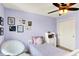 Comfortable bedroom features a soft chair and pastel walls for a calming atmosphere at 14499 Milton Rd, Fishers, IN 46037