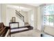 Inviting foyer features staircase, chandelier, and decorative accents at 14499 Milton Rd, Fishers, IN 46037
