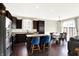 Modern kitchen features a large island and stainless steel appliances at 14499 Milton Rd, Fishers, IN 46037