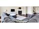 Inviting living room features a fireplace and a comfortable sofa at 14499 Milton Rd, Fishers, IN 46037