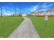Scenic walking trail near residential homes, promoting a healthy lifestyle and neighborhood connectivity at 14499 Milton Rd, Fishers, IN 46037