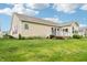 Large backyard with lush lawn, landscaping, and a deck area, perfect for outdoor enjoyment at 1468 Blackthorne N Trl, Plainfield, IN 46168