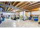 Unfinished basement offering potential for customization, featuring exposed beams and concrete flooring at 1468 Blackthorne N Trl, Plainfield, IN 46168