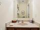 Well-lit bathroom features a modern sink, vanity, mirror, and neutral color scheme at 1468 Blackthorne N Trl, Plainfield, IN 46168