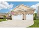 Charming two-story home with a brick facade, two-car garage, and well-manicured lawn at 1468 Blackthorne N Trl, Plainfield, IN 46168