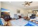 Comfortable living room with ample seating and a view of the adjacent spaces at 1468 Blackthorne N Trl, Plainfield, IN 46168