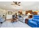 Comfortable living room with ample seating and a view of the open kitchen at 1468 Blackthorne N Trl, Plainfield, IN 46168